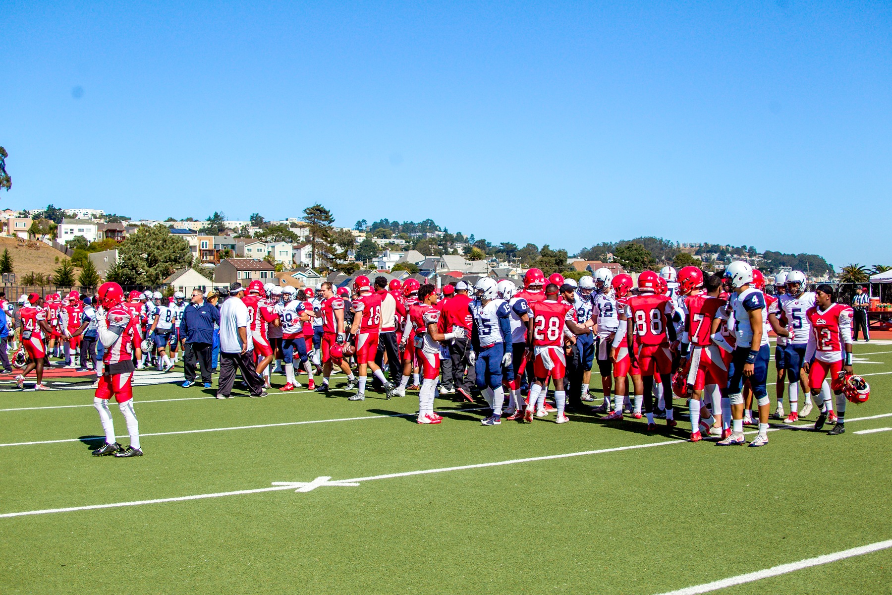 CCSF meet the SRJC players to exchange handshakes before the game. 
