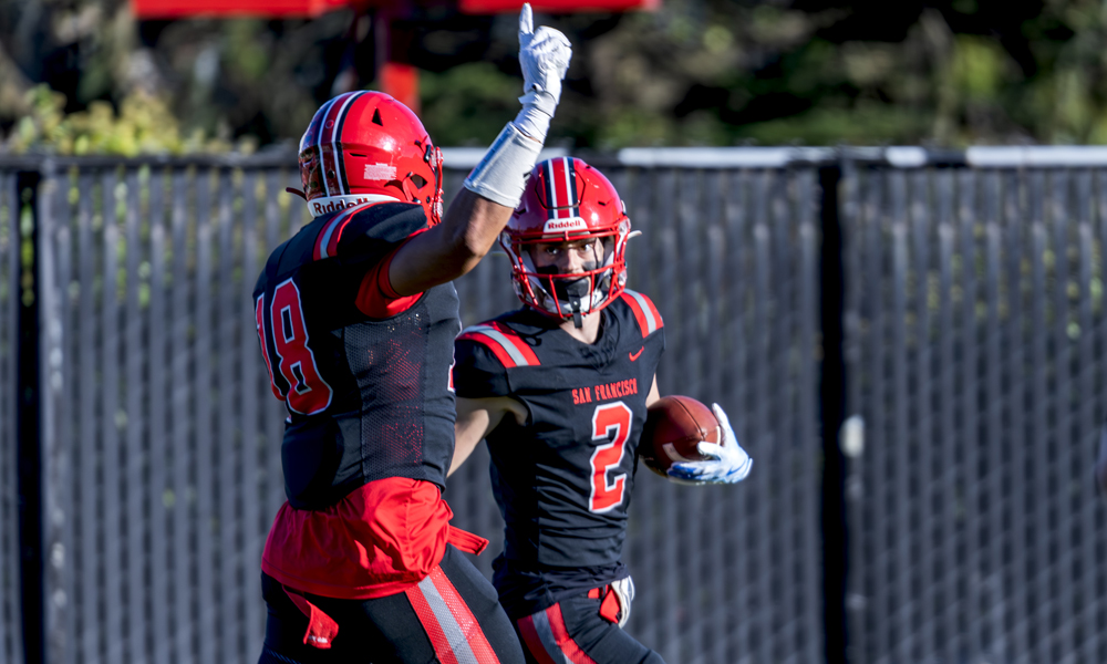 Bryson Waterman celebrates his TD in the Rams' win over Diablo Valley. (Photo by Eric Sun)