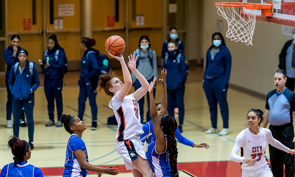 Sierra Kolomatangi drives to the hoop in CCSF's opening-night win over West LA. (Photo by Eric Sun)