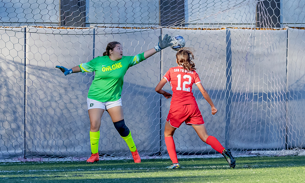 Melissa Cuevas scores her third goal of the game for the hat trick against Ohlone. (Photo by Eric Sun)